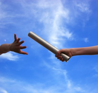 iStock_000000416519Small-passing-a-baton